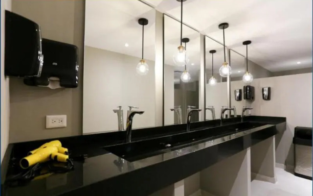 The Yellow Capsule Cancún