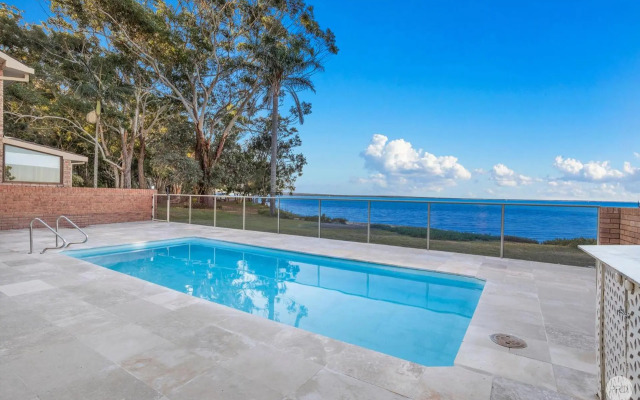 Seaside Sanctuary - Waterfront Luxury Home with Heated Pool