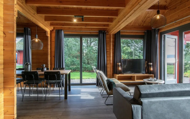 Restyled Wooden Lodge Near the Maasduinen