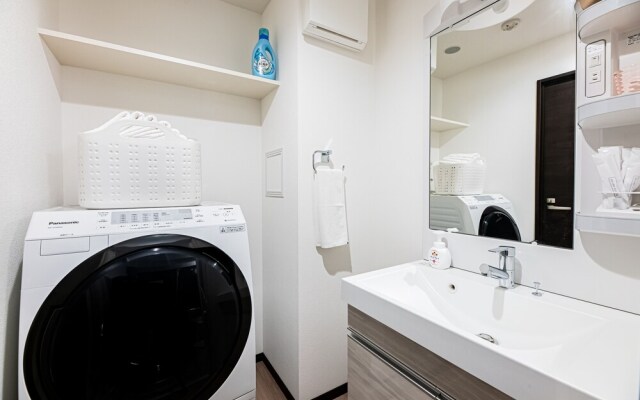 Tomariehotel & condominium