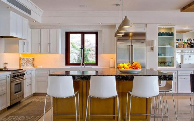 Spectacular 3-Story Beachfront Villa with a Huge Pool Patio