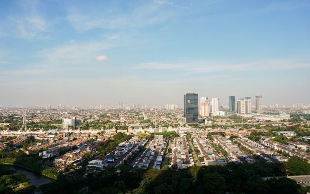 Minimalist Studio Room at Puri Mansion Apartment