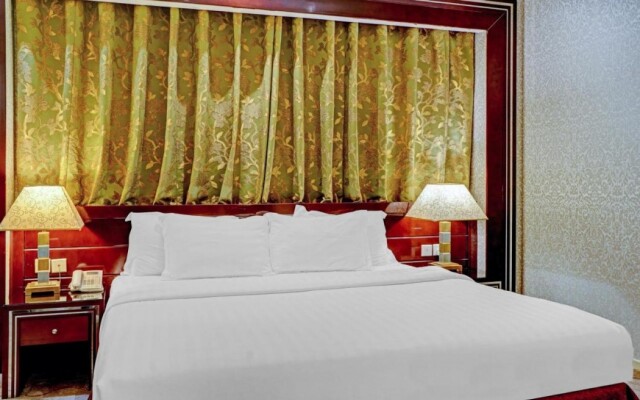 Capital O 596 Garden Palace Hotel