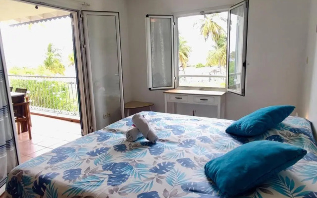 Ti Punch Appartement pied dans l'eau avec piscine