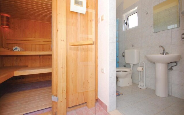 Nice Home in Kastel Novi With Sauna, Wifi and 4 Bedrooms