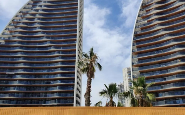 SUNSET WAVES blue sky apartment