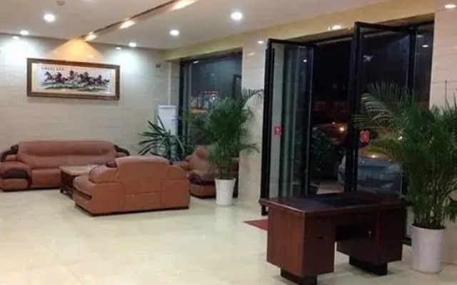 7 xing Ge Business Hotel