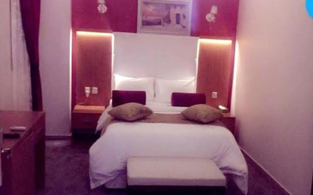 Capital O 338 Asian Hotel