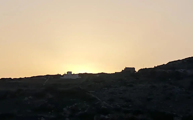 Romantic sunset cycladic house in Sotires