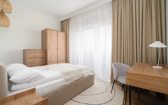 Beige Apartment Poznań by Renters