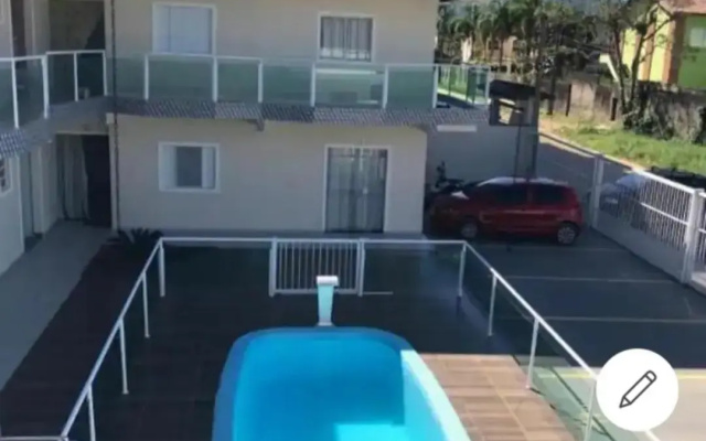 Apartamento encantador com piscina