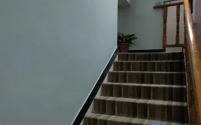 Lichuan Dushi Yijia Homestay