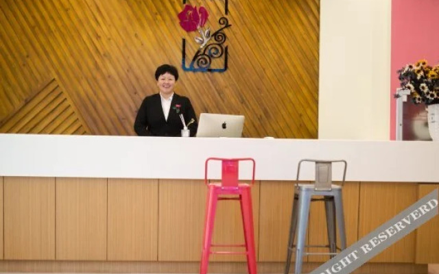 Rose Blooming Hotel(蔷薇花开酒店(青岛国际会展中心店))