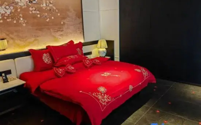 Zhenyue Meijing Hotel (Qinzhou Baishihu Park Wuyue Plaza)