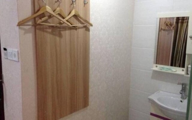Qujing Ruixin Business Hotel