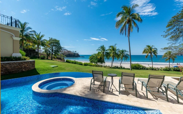 Mediterranean-style Flamingo Mansion Offers the Ultimate in Beachfront Luxury