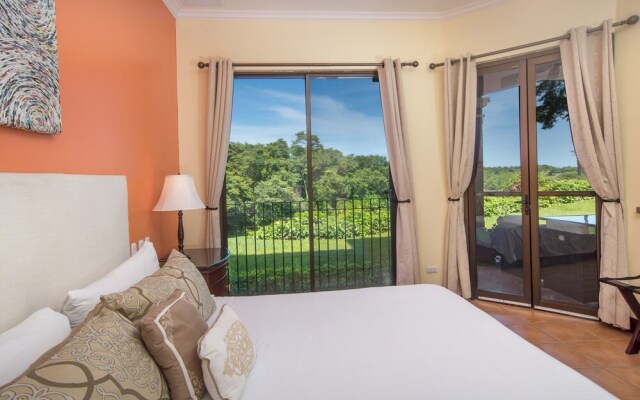 Peek-a-Boo Ocean view Condo at Reserva Conchal