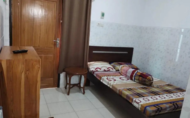 OYO 91233 Bismo 85 Family Syariah