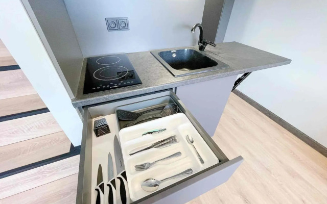 Двухуровневая квартира в стиле Лофт на Нагорной