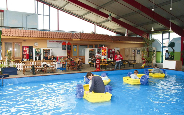 Apartment in Burhave with a shared pool