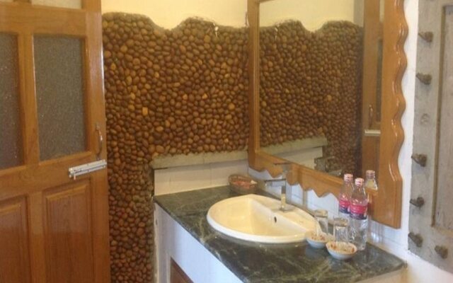 Teak Wood Hotel