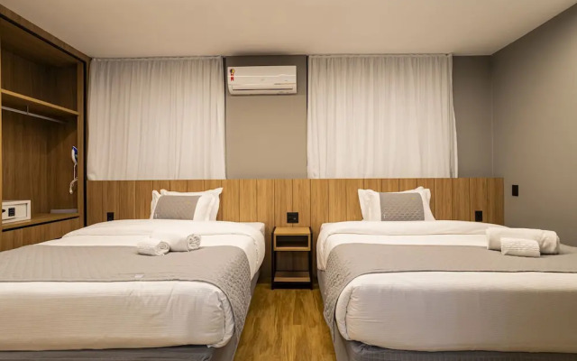 You Stay at Vila Olimpia - The World