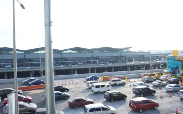 Palm Tree Condos Across Naia3 By Beth