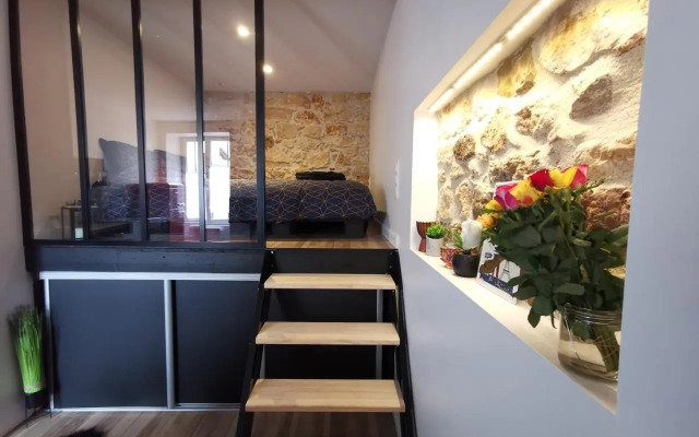 Studio atypique dans bel immeuble de 1820