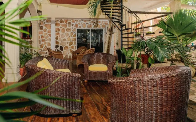 hotel y hostal nojoch che