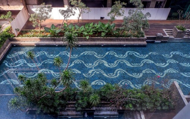 Cozy Pool View Kemang Village Residence Apartment with Direct Access To Mall