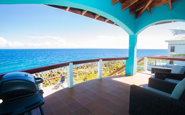 Stunning Coral View Home with Oceanfront Pool by RedAwning