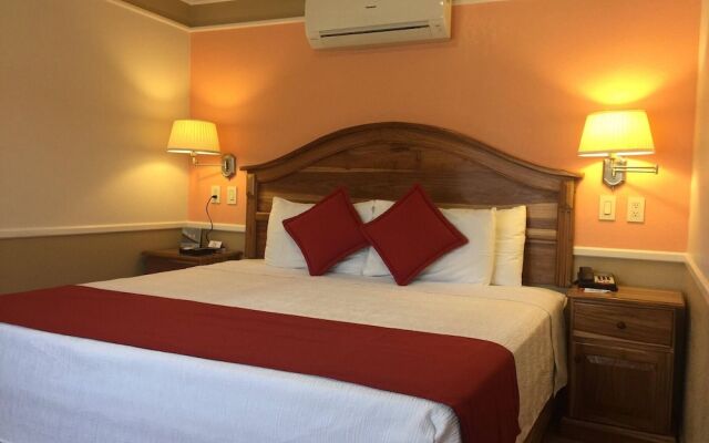 Prado Inn & Suites