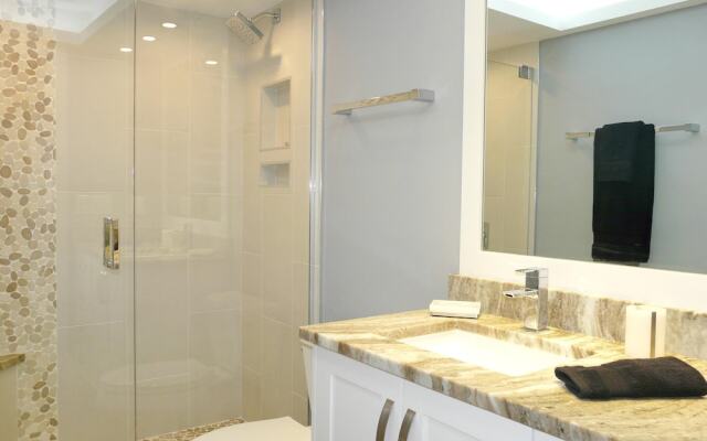 Elegant Beachfront Condo in Private Community