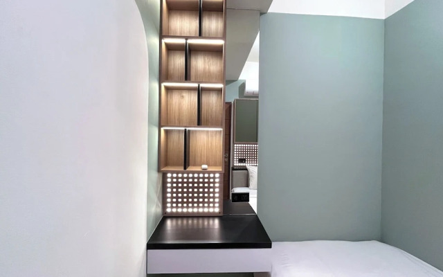 Warm And Homey 2Br At Vida View Makassar Apartment