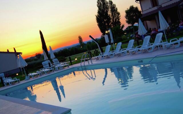 An agritourism complex with views of Assisi.