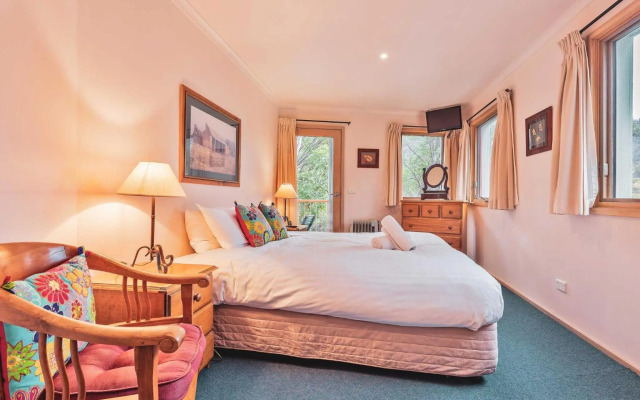 Lhotsky 2 Bedroom with fireplace and sweeping mountain view