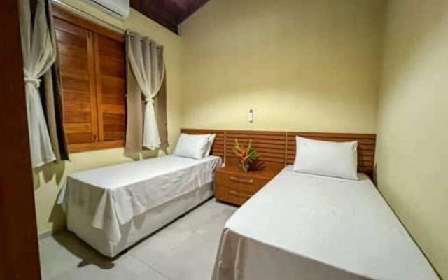 Casas e Suites Aconchego