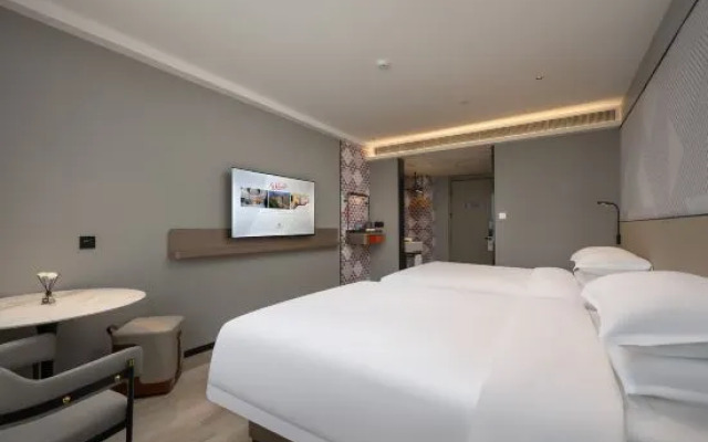 Berman Hotel (Zhanjiang Wuchuan Jiefang Middle Road Gangfeng Plaza)