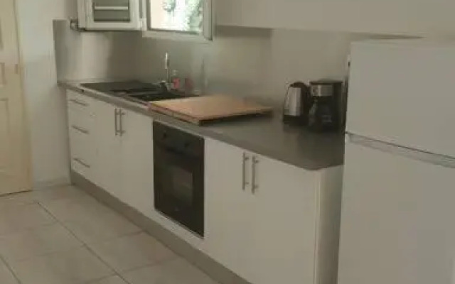 Villa tropicale charmant T2 dans un cadre verdoyant