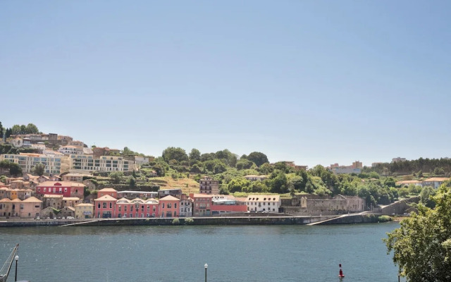 Miragaia Riverside Suites.