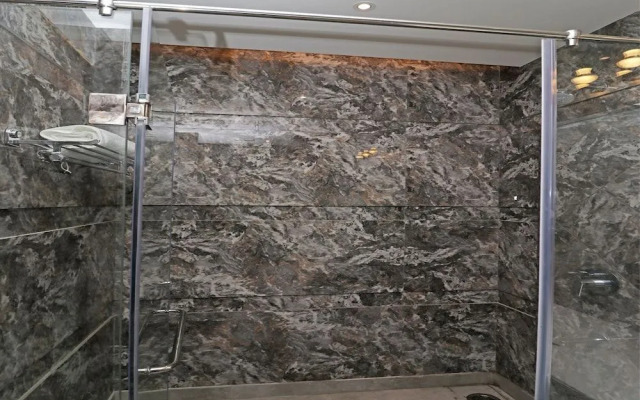 C Pearls Hotel  Banque by OYO Rooms