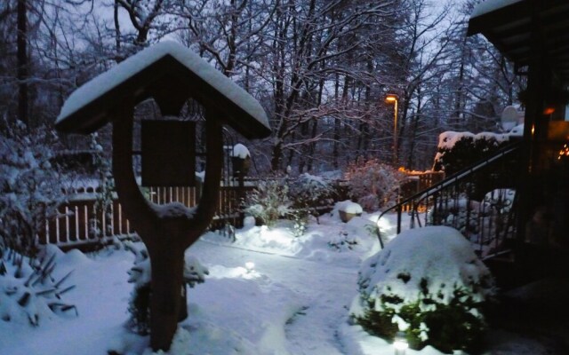 Ferienwohnung im Wald mit Kamin