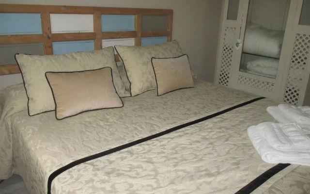 Apartamento Bizcocheros con piscina y jardin