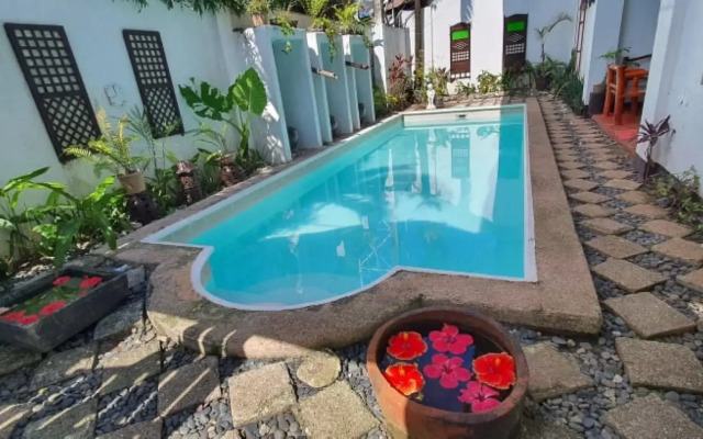 RedDoorz Plus Evangeline Beach Resort