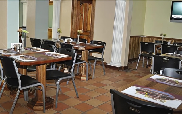 Prado Inn & Suites