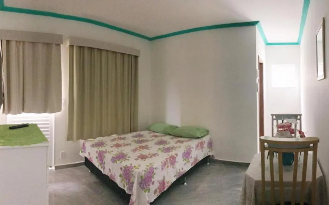 Suíte com cozinha no quintal da casa