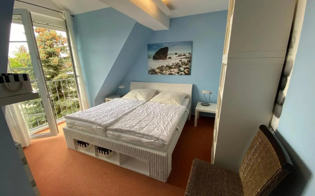 Ferienwohnung im Poolhaus mit Ostseeblick