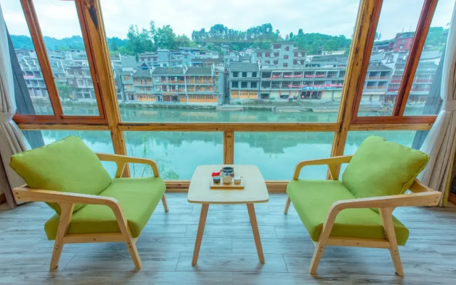 Floral Hotel Fenghuang Huercaowu
