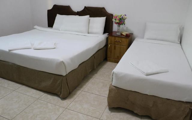 Al Alya Hotel Rooms and Suites