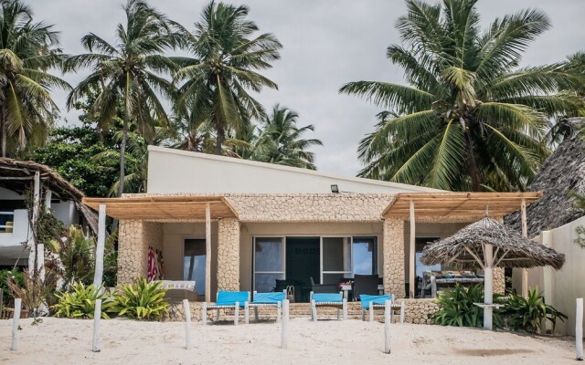 Neema Barefoot Beach House